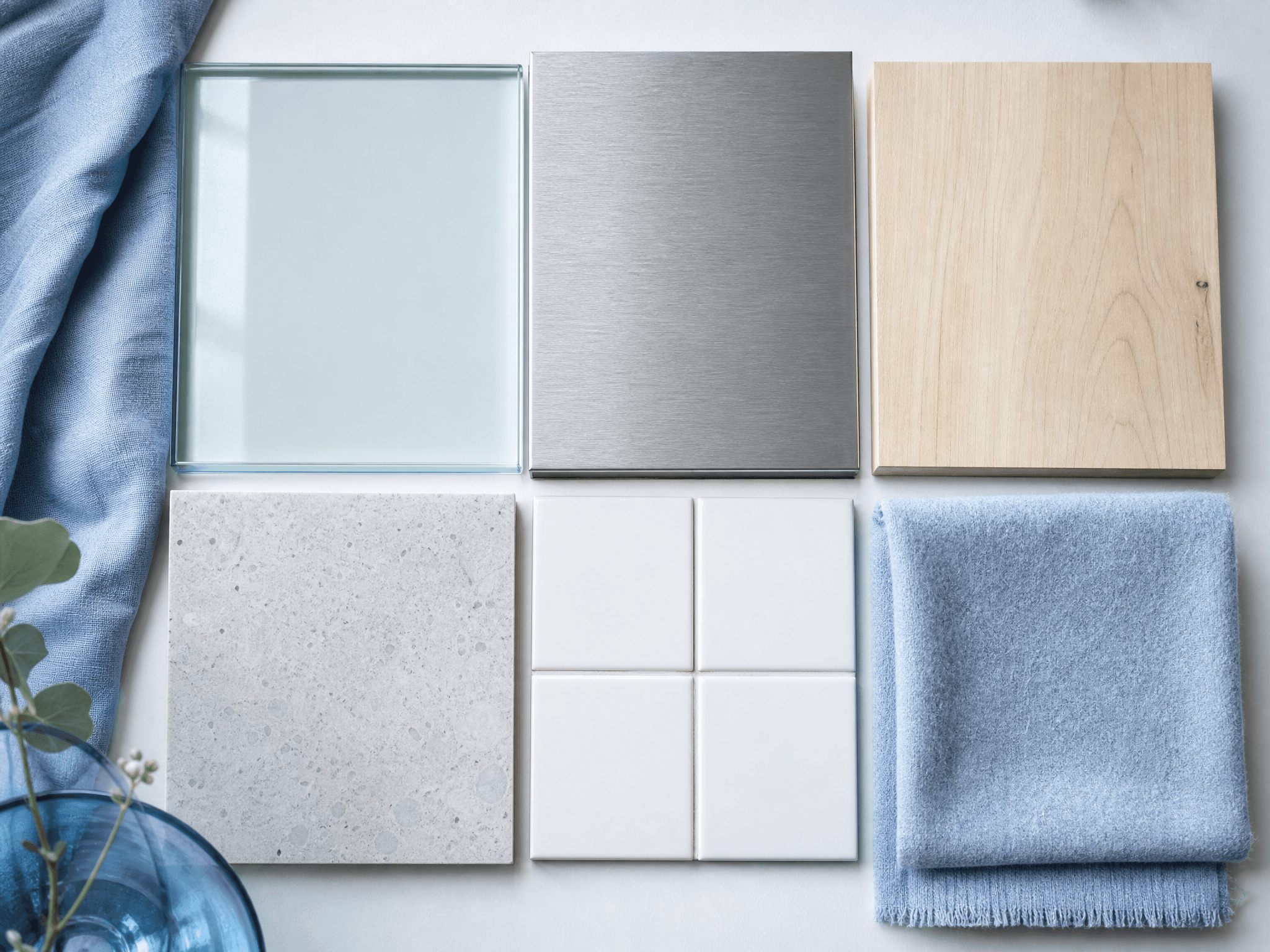 Material-safe guide showing glass, steel, wood, stone, tile and wool swatches